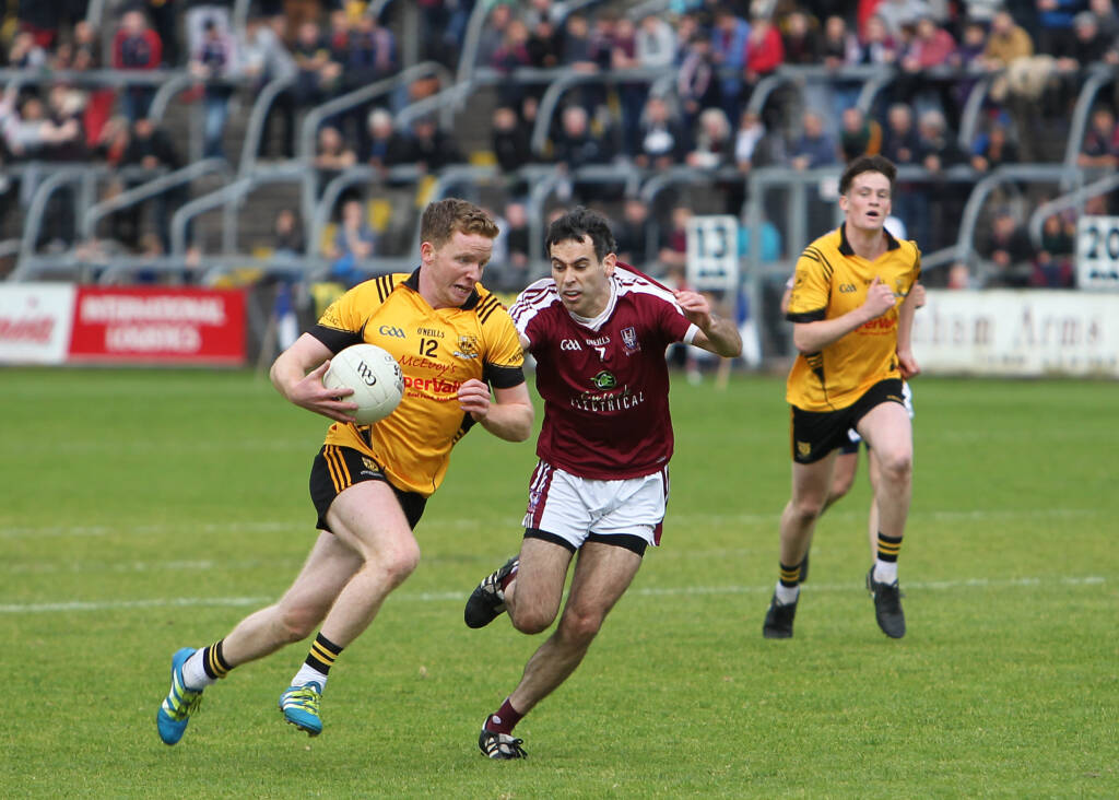 Jack Brady takes on Caolan McBreen. Photo: Adrian Donohoe.